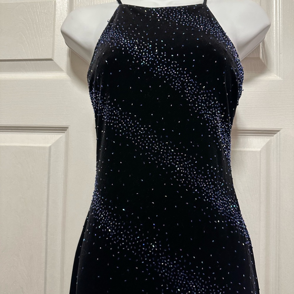 Black with sparkle detail gown looks black/navy. From Lord and Taylor.